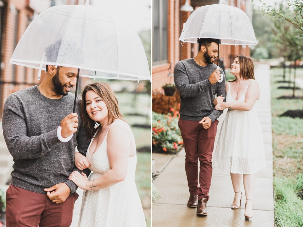 couple under umbrella during engagement session with M Harris Studios