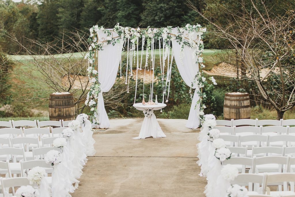 arbor for outdoor wedding ceremony at Old Hickory Golf Club