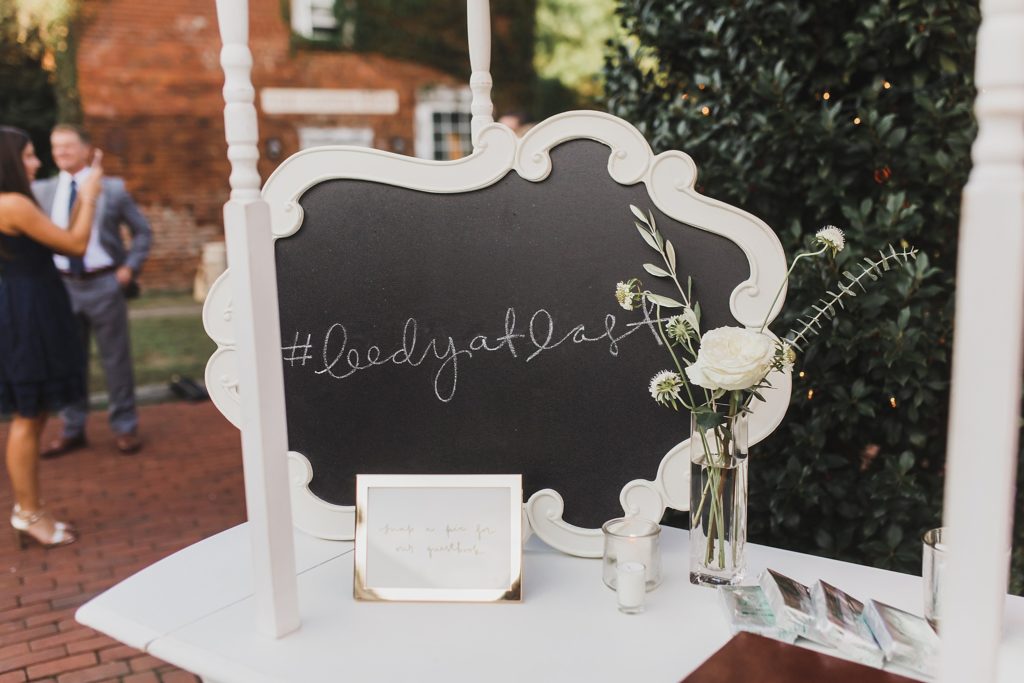 chalkboard sign at Inn at the Old Silk Mill wedding photographed by M Harris Studios