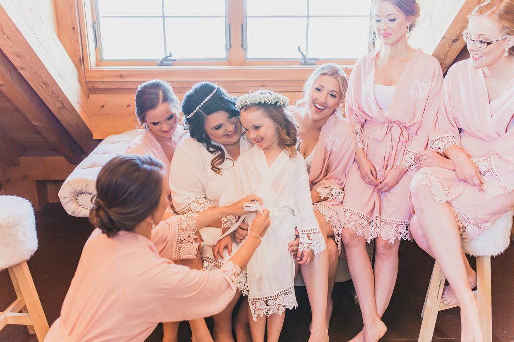 bride and bridesmaids prepare for Thousand Acre wedding photographed by M Harris Studios
