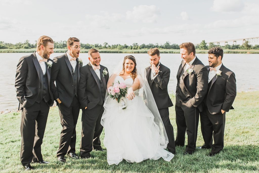 bride and groomsmen at Thousand Acre Farm photographed by M Harris Studios