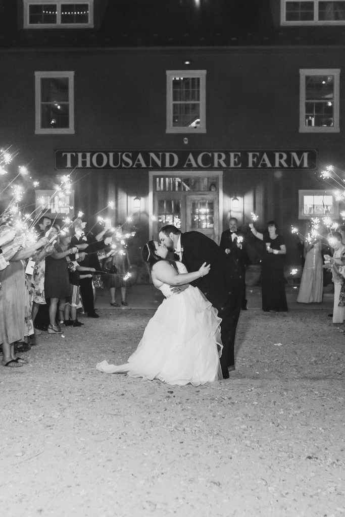 Thousand Acre Farm wedding reception sparkler exit photographed by M Harris Studios