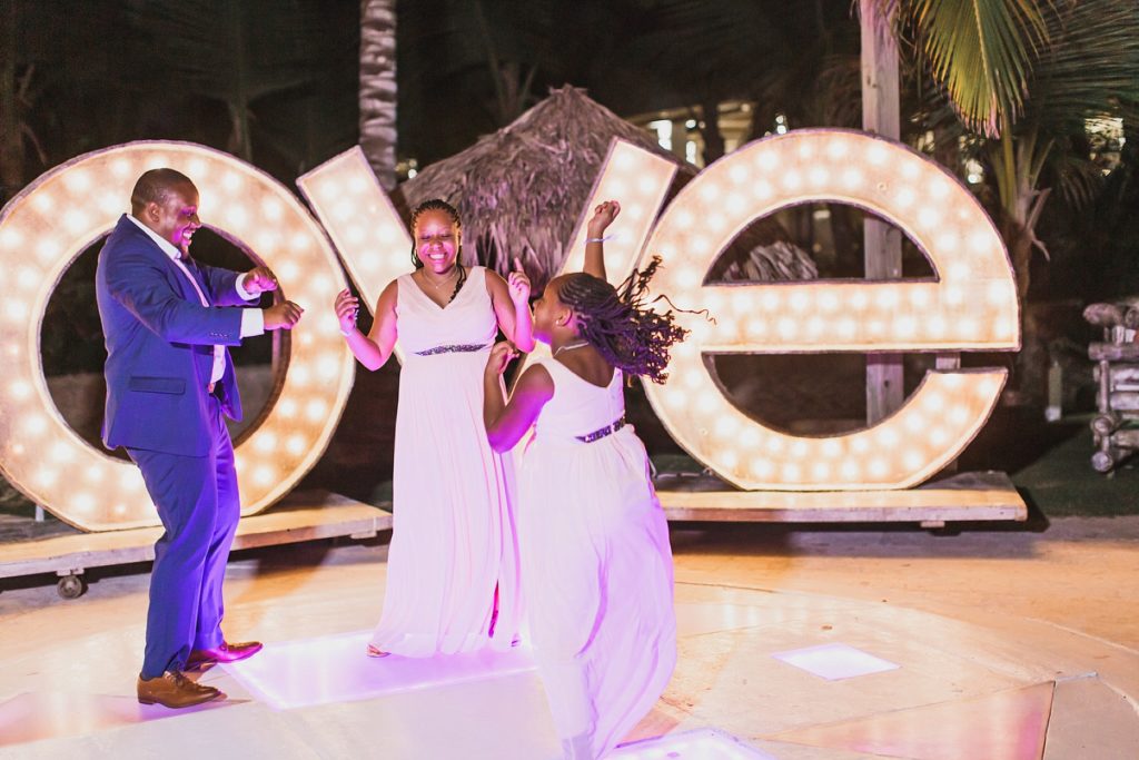 groom dances with his girls photographed by M Harris Studios