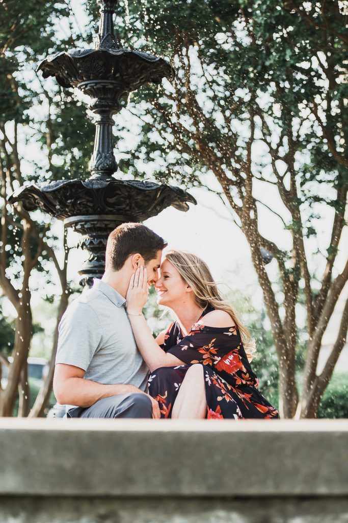 Shockoe Bottom engagement portraits by fountain with M Harris Studios