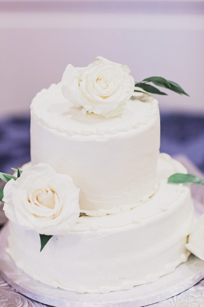 two-tiered wedding cake photographed by M Harris Studios