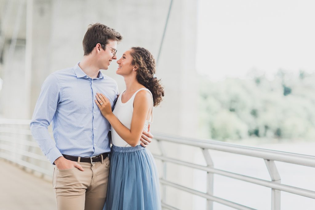 Engagement session on the Belle Island pedestrian bridge and by the rapids on the island in Richmond, VA